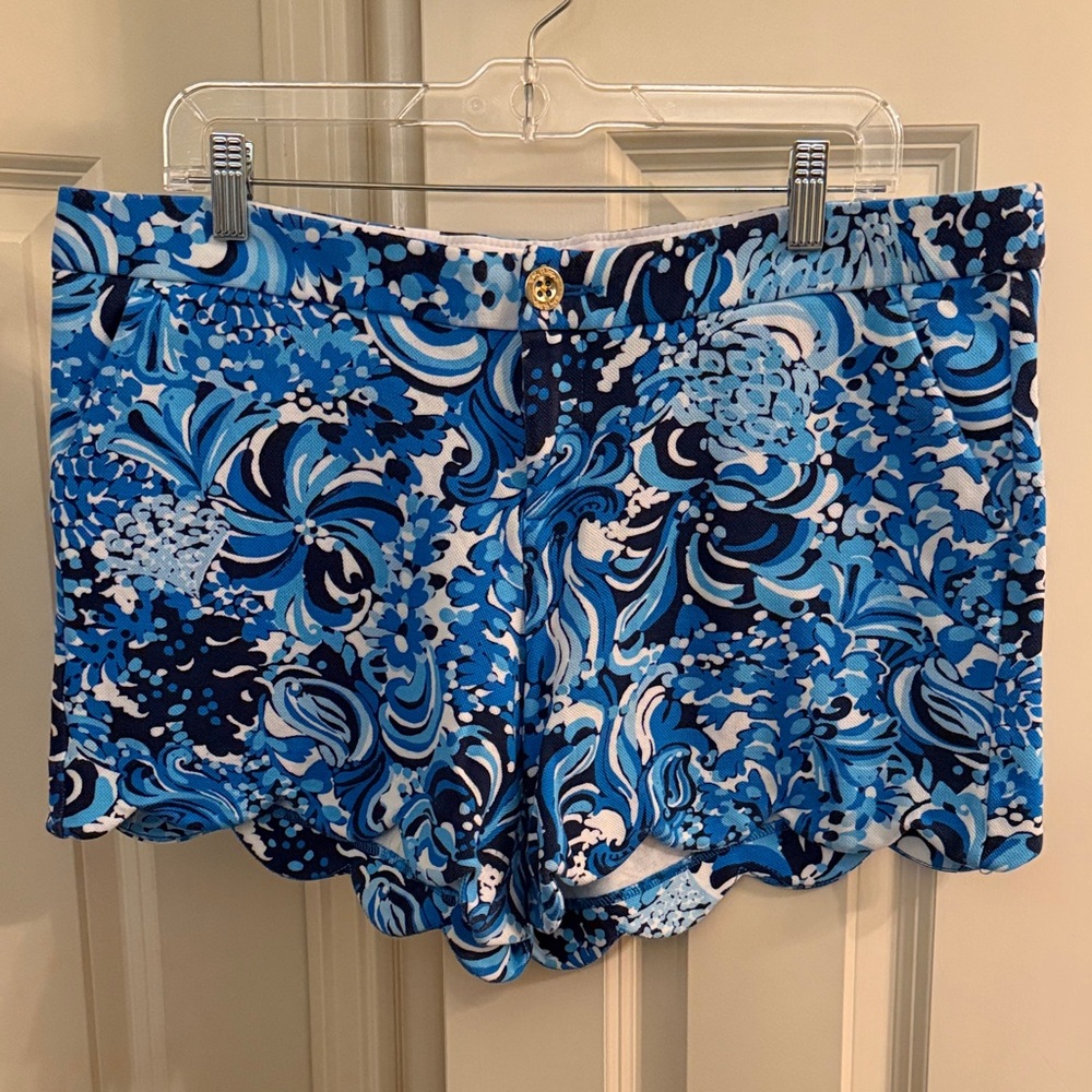 Lilly Pulitzer Vibrant Blue Floral Shorts with Scalloped Hem.